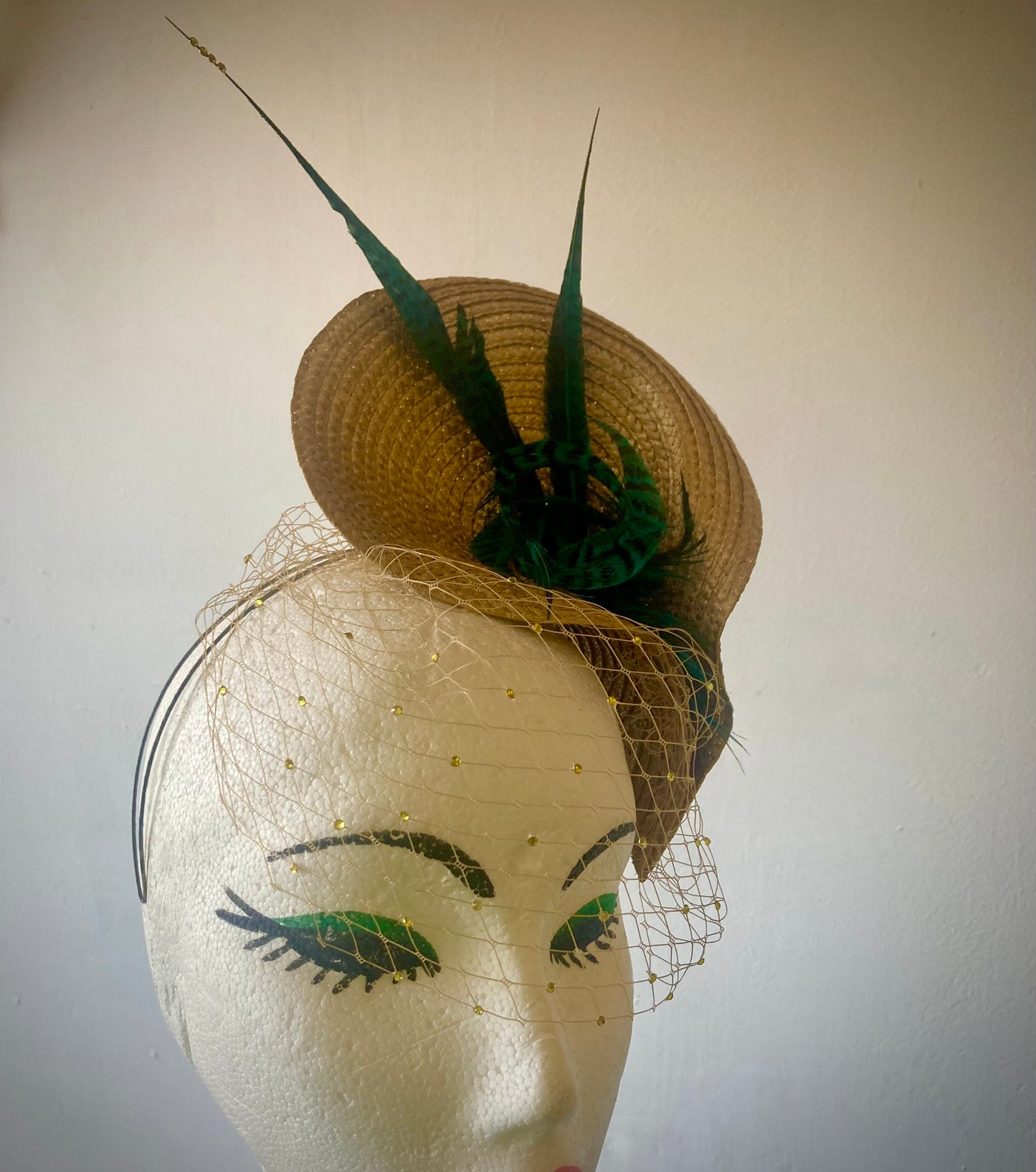 Gold vintage style wedding hat with teal pheasant feathers