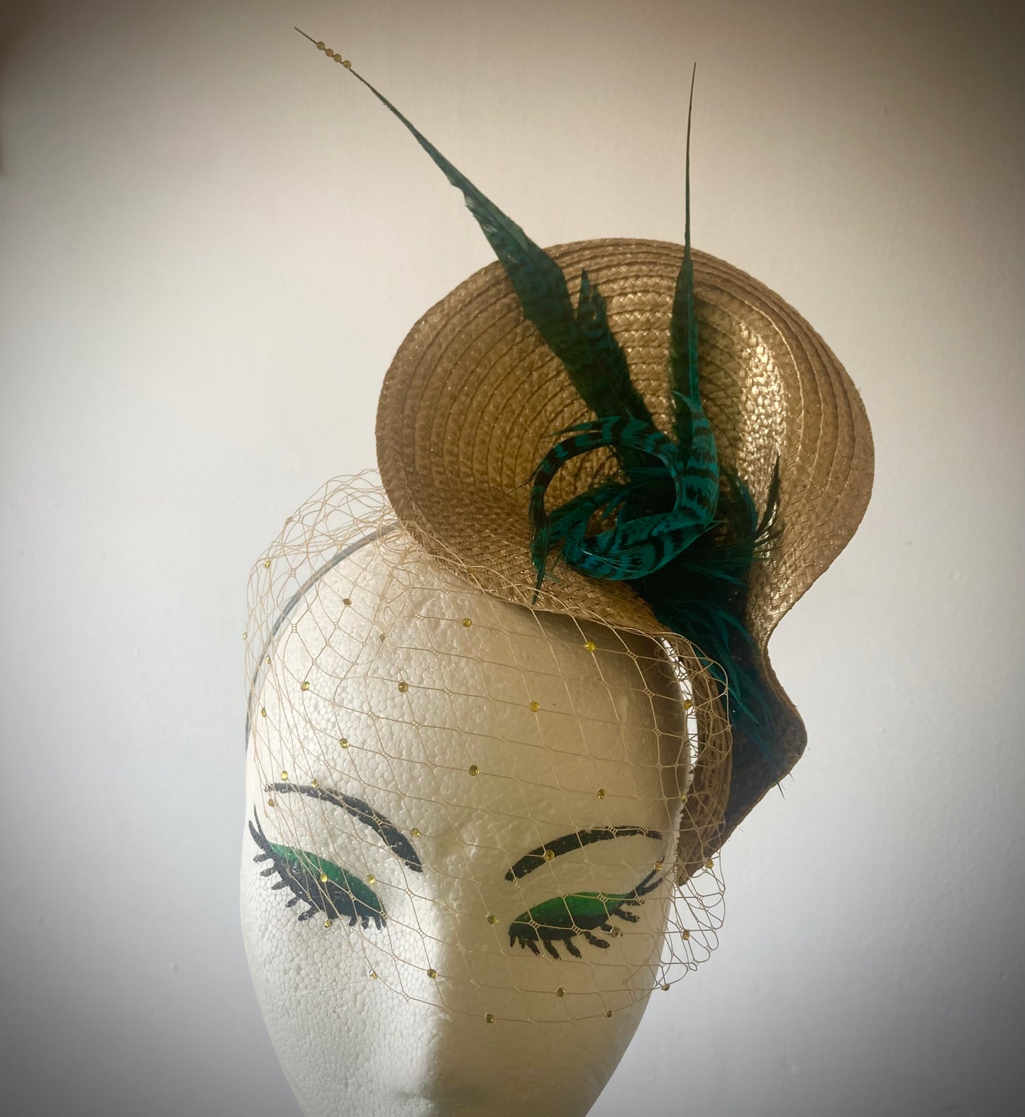 Gold vintage style wedding hat with teal pheasant feathers