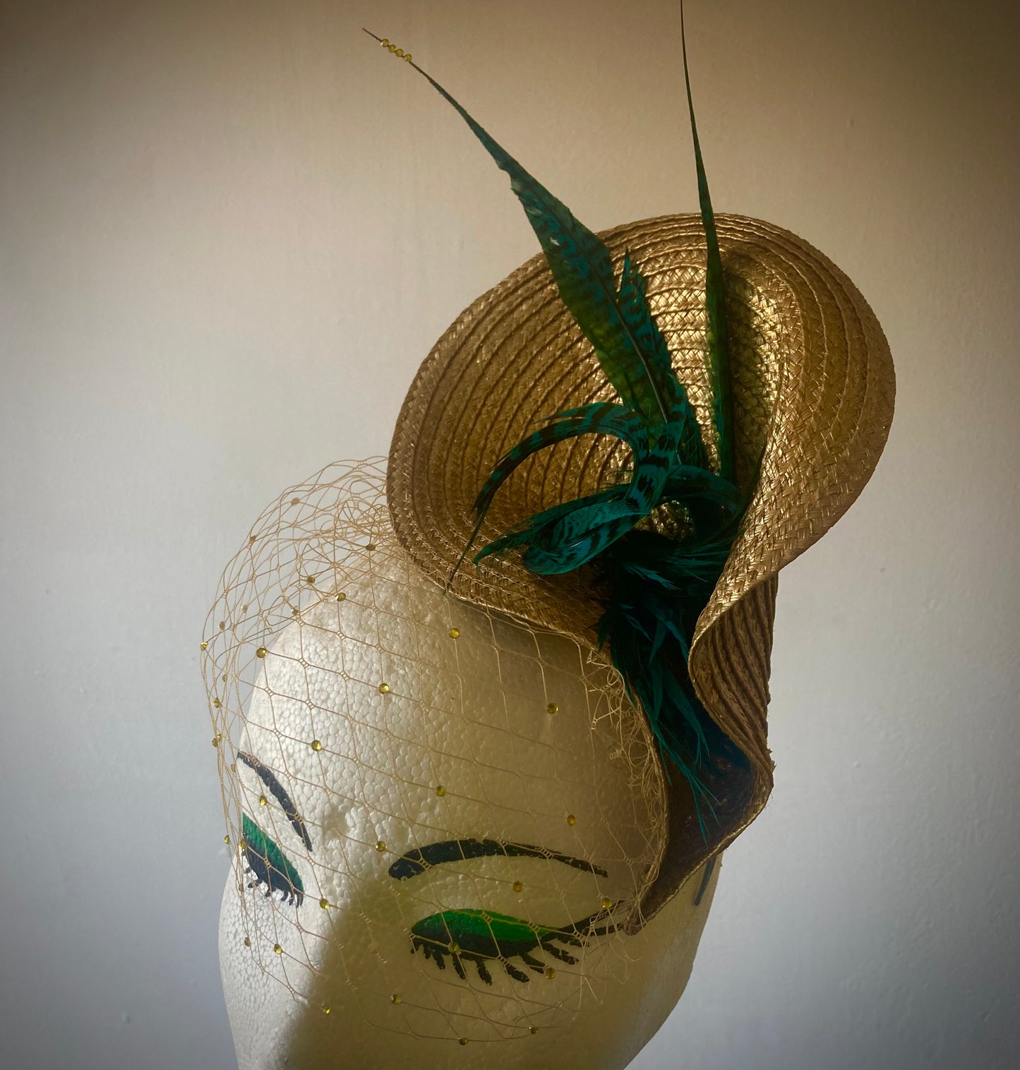 Gold vintage style wedding hat with teal pheasant feathers